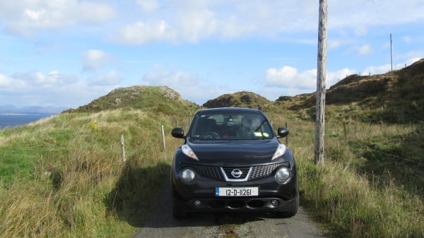 small car on farm road